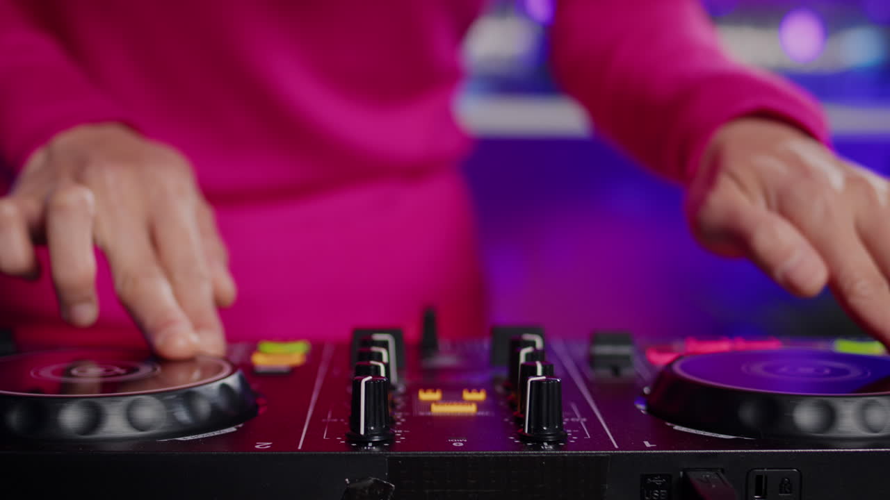 DJ using a DJ controller