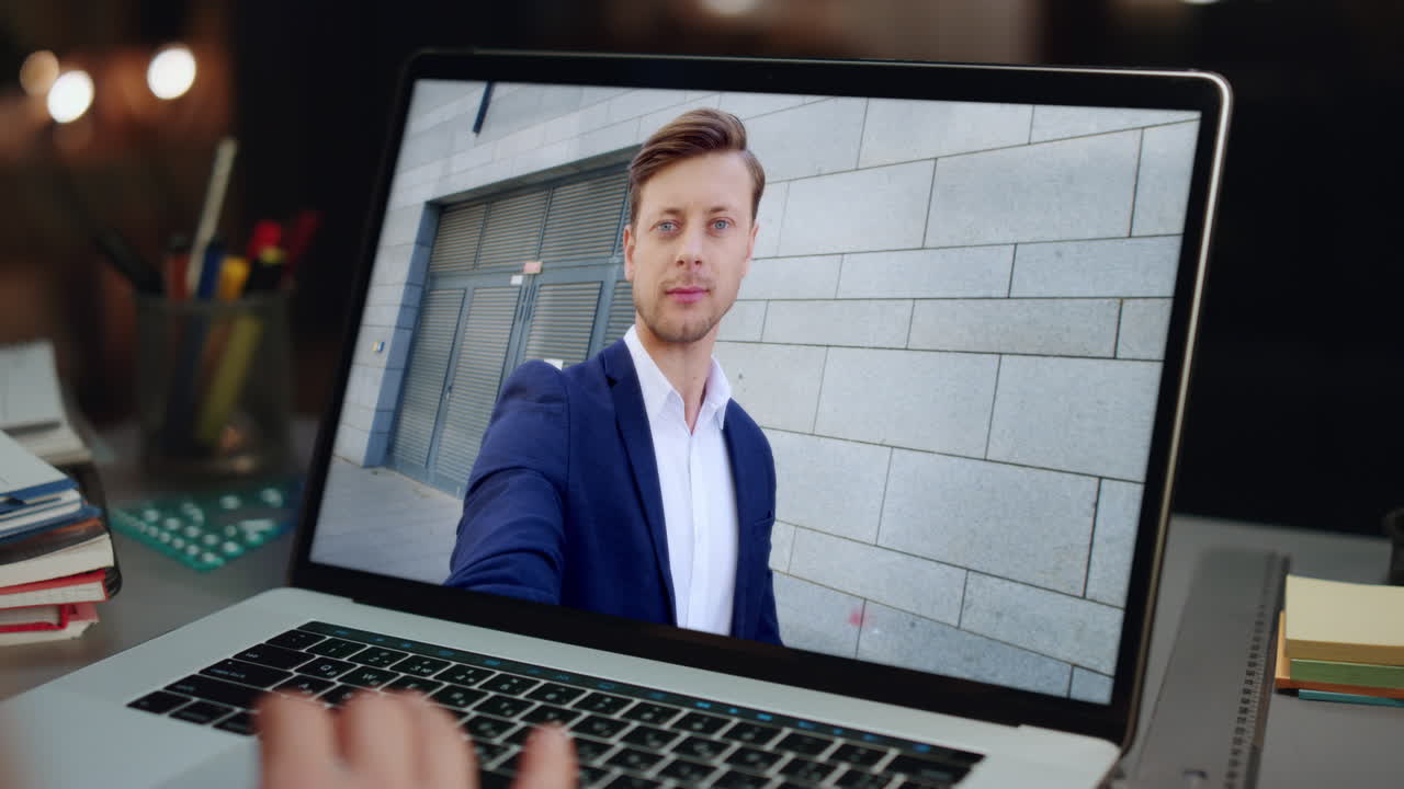 Unrecognizable girl talking remote conference by laptop with businessman closeup