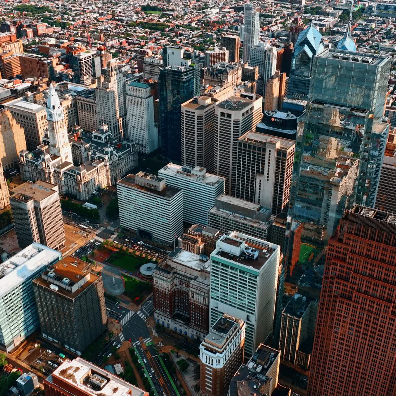 Densely built cityscape of Philadelphia from aerial view. Panorama of the metropolis on bright daytime