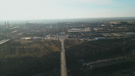 galati viaduct bridge and industrial area in smog on sunny day in galati, romania. aerial shot