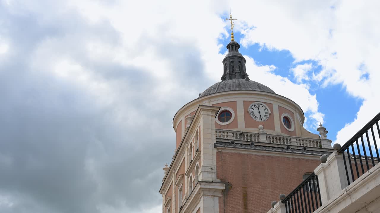 Aranjuez Royal Palace, Spain: The clock tower of the 18th-century royal residence showcases its grand architecture—a famed tourist landmark and symbol of rich royal heritage.