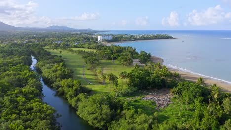 lush green landscape in desembocadura, rio munoz, puerto plata, dominican republic - aerial shot