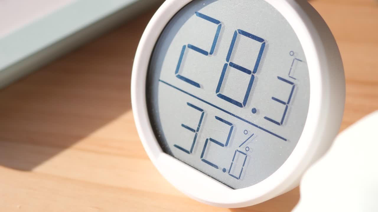 Digital Hygrometer on Wooden Table