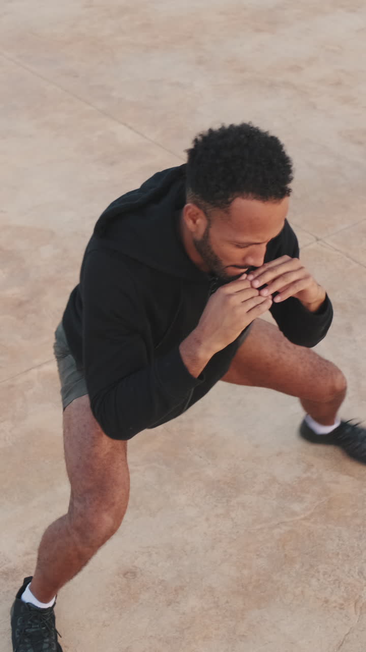 Man Doing Squats Outdoor