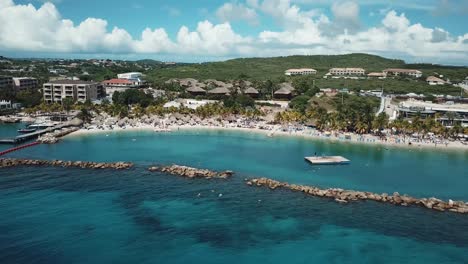 Aerial-view-of-the-tropical-coastline-of-Curacao-in-the-Dutch-Caribbean-and-its-pristine-beaches-and-Vibrant-Water-Colors