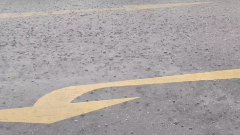 rain on the road during the rainy season that the car roaming through the zebra crossing