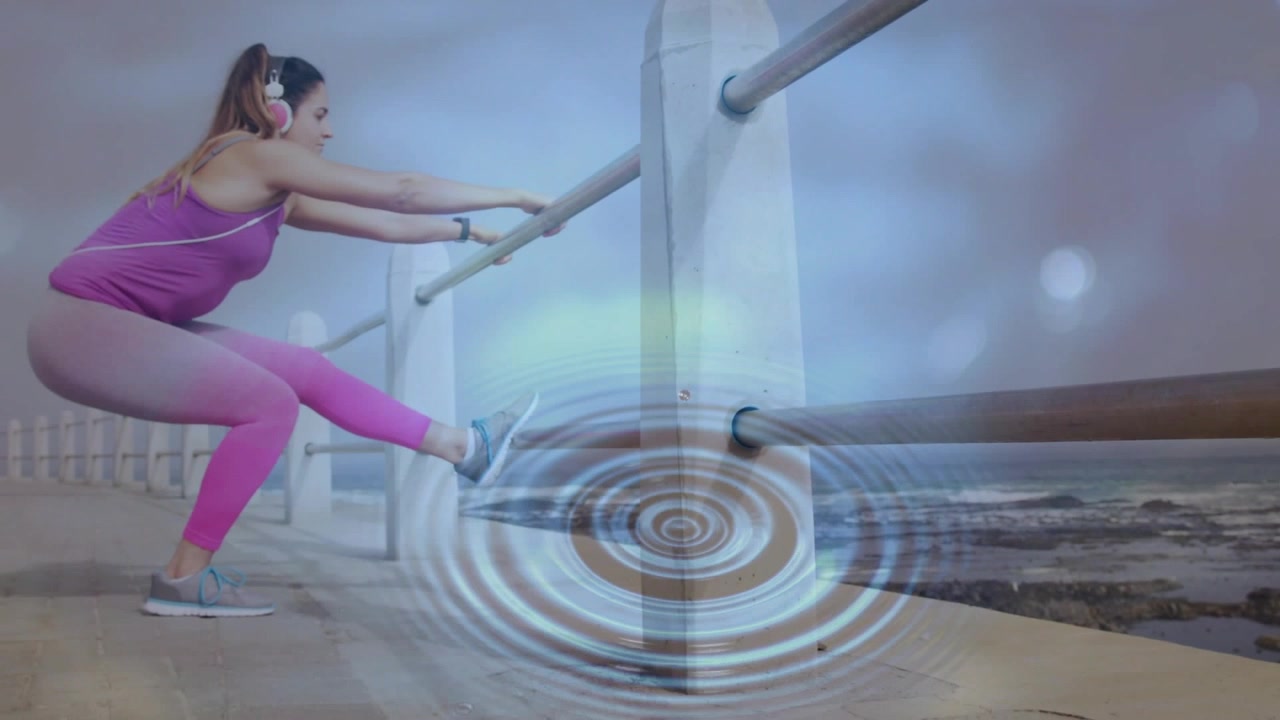 Vertical video: Ripple growing woman in pink on rail, doing one-leg squats on promenade, copy space