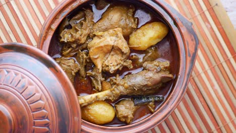 chicken curry with potatoes in a pot