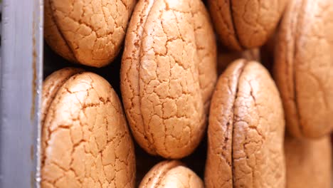 close-up of stacked brown macarons