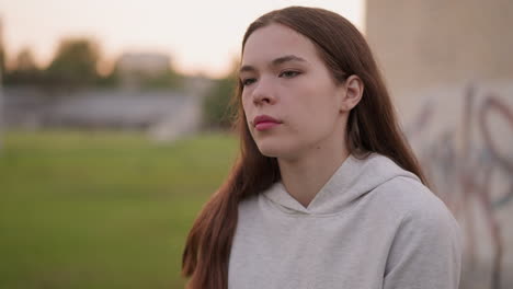 young woman looking away from camera