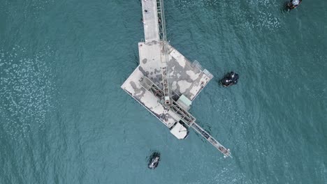 historic coal mining platform located out in the ocean waters