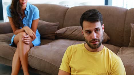 Couple-arguing-with-each-other-in-living-room