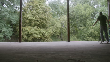 caucasian boys skateboarding in a ruined building.