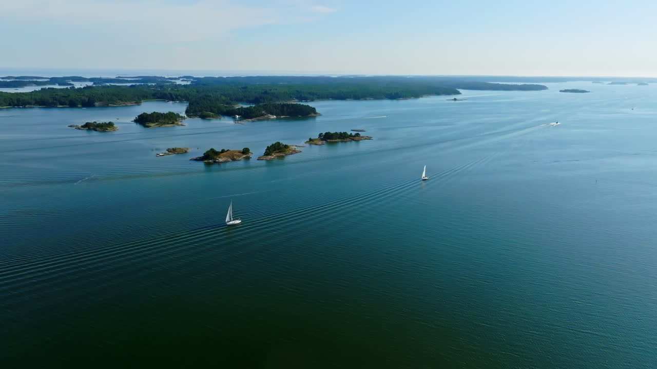 Aerial view away from sailboats in the archipelago on the gulf of Finland, summer