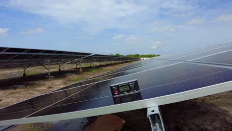 Close-up-of-Digital-protractor-on-a-solar-panel-installation-photovoltaic-farm-testing-and-measurements-of-the-efficiency,-renewable-green-energy-in-Jambur-Gambia-Africa