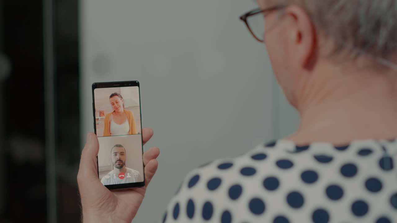 Sick patient talkinng on videocall with relatives