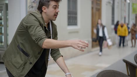 street magician performing rope trick