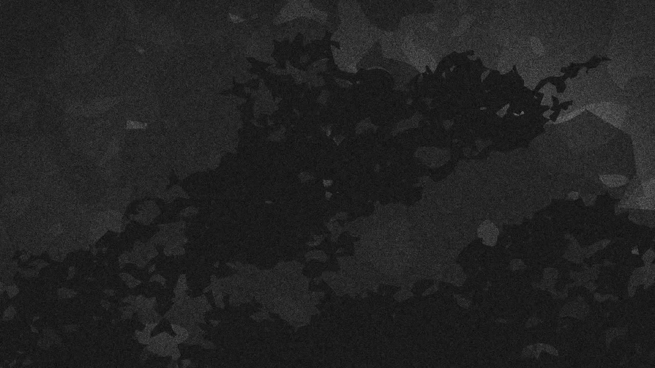 animación de chispas y formas negras sobre un fondo gris