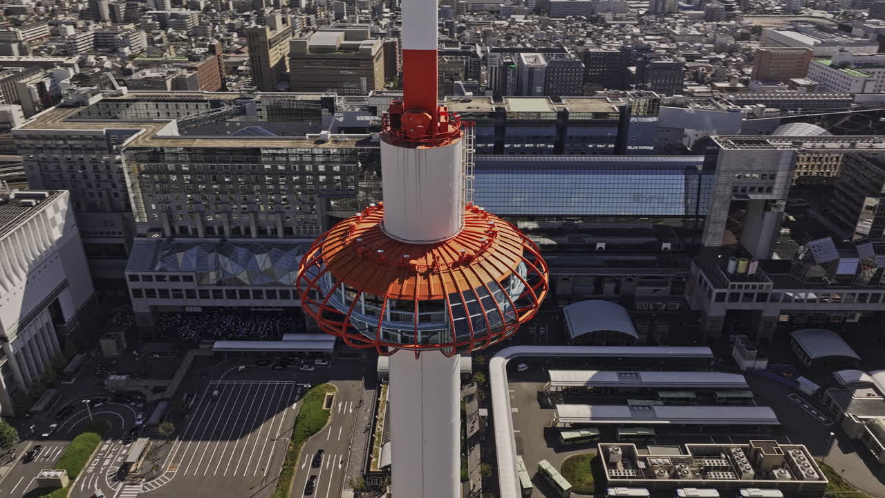 Kyoto Japan Aerial v81 panoramic birds eye view drone fly around the landmark tower capturing major railway station and views of downtown Shimogyo ward - Shot with Mavic 3 Pro Cine - Oct 8th 2023