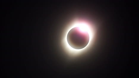 pink glow of chromosphere heralds the diamond ring effect during a total solar eclipse