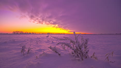 Evening-clouds-fast-moving-away-and-rolling-dark-sunset-sky,-orange-purple-orange-blue-pink-cloudscape-time-lapse-background