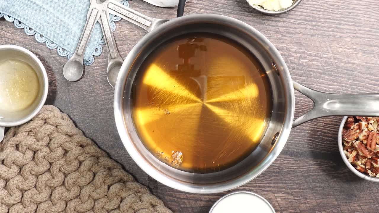 Baking delicious caramel pecan brownies. In a sauce pan adding brown sugar to the other ingredients. Freshly baked gooey chocolate brownies with sweet caramel and nutty pecans.
