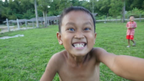 happy boy playing outdoors
