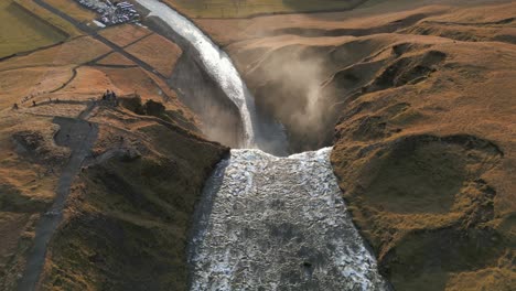 Unique-aerial-shot-flying-over-Skogafoss-Waterfall