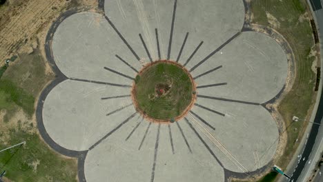 4K-high-resolution-aerial-drone-video-view-of-the-flower-highway-interchange-with-Israeli-flags--Rishon-Lezion--Israel