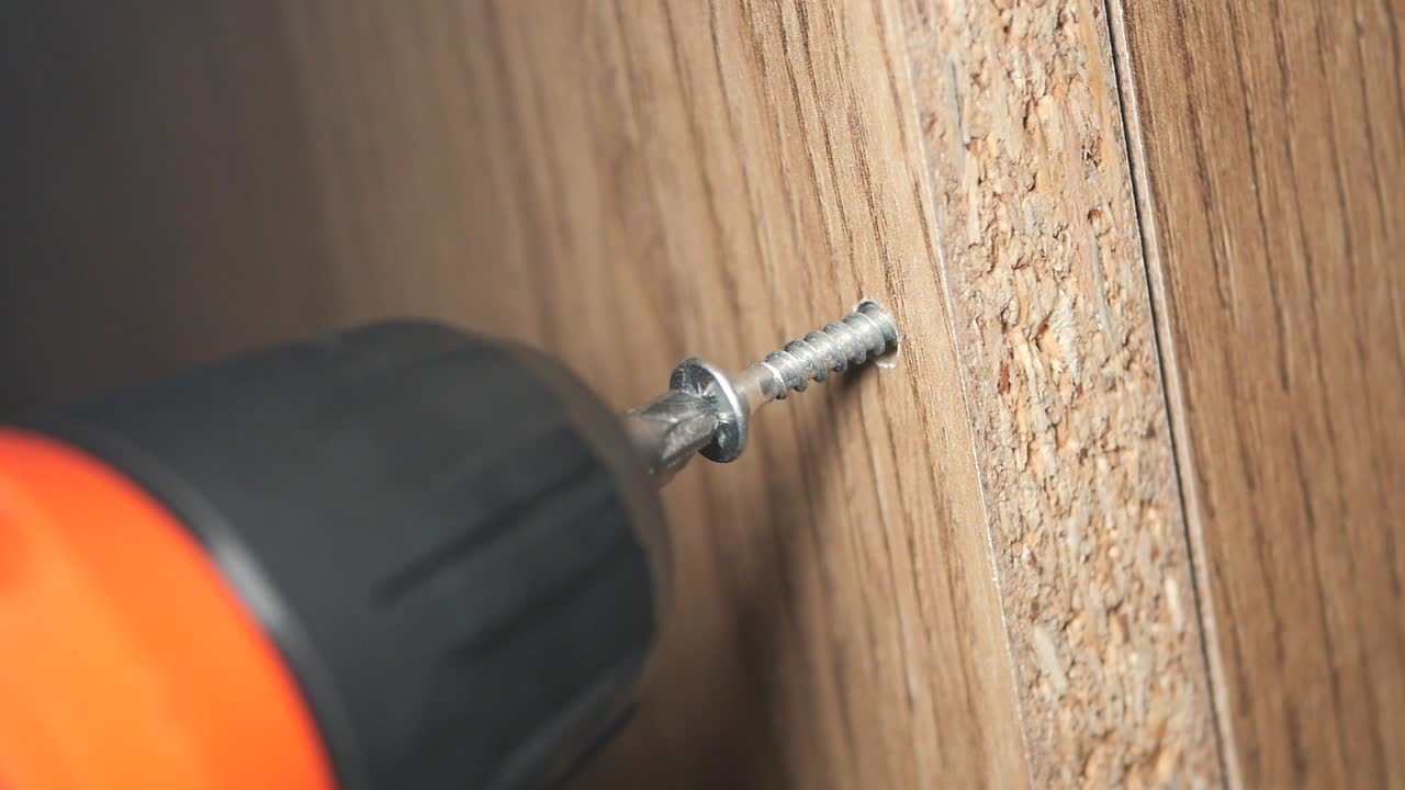 Driving a Screw into Wood with a Drill
