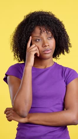 young woman thinking deeply or experiencing a headache