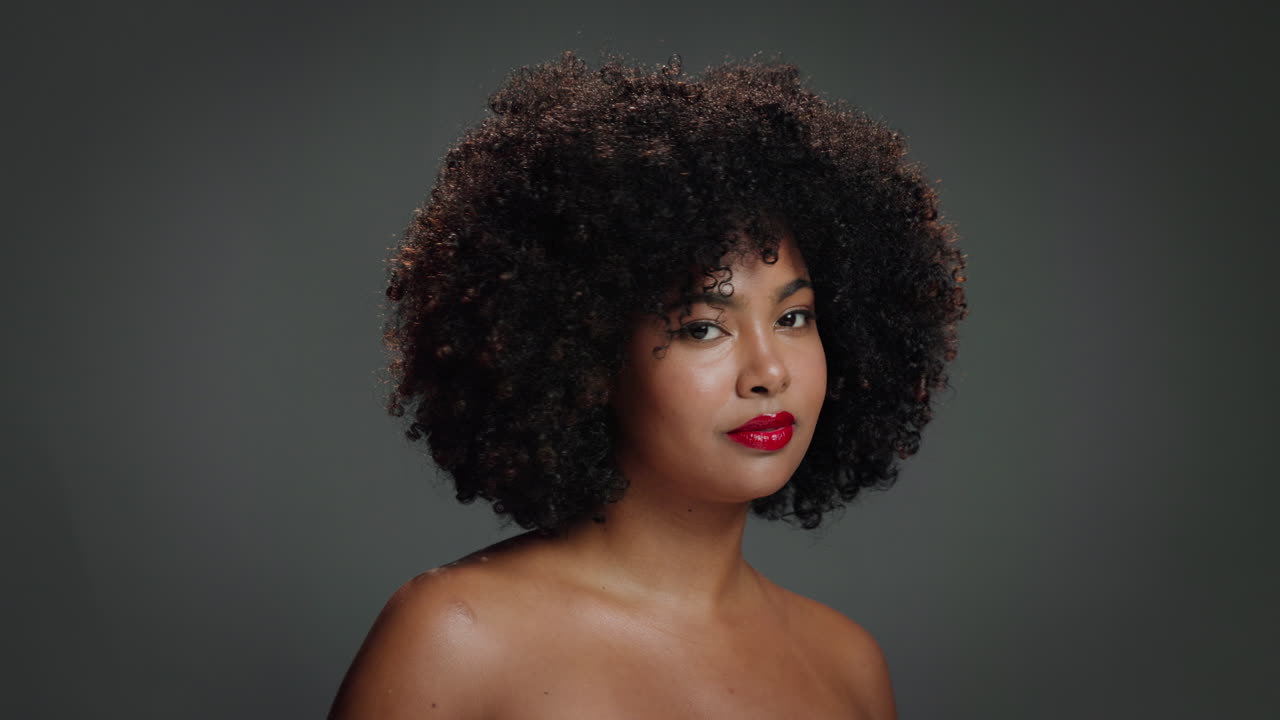 Portrait of a woman with afro hair
