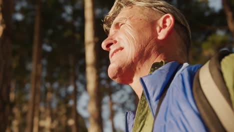 active senior hiking in forest