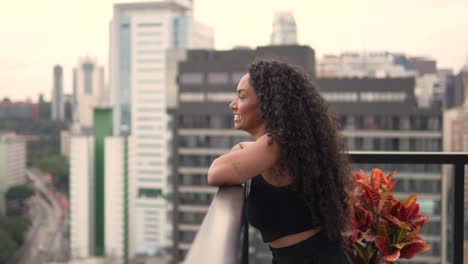 beautiful-black--woman-smiling-at-the-balcony