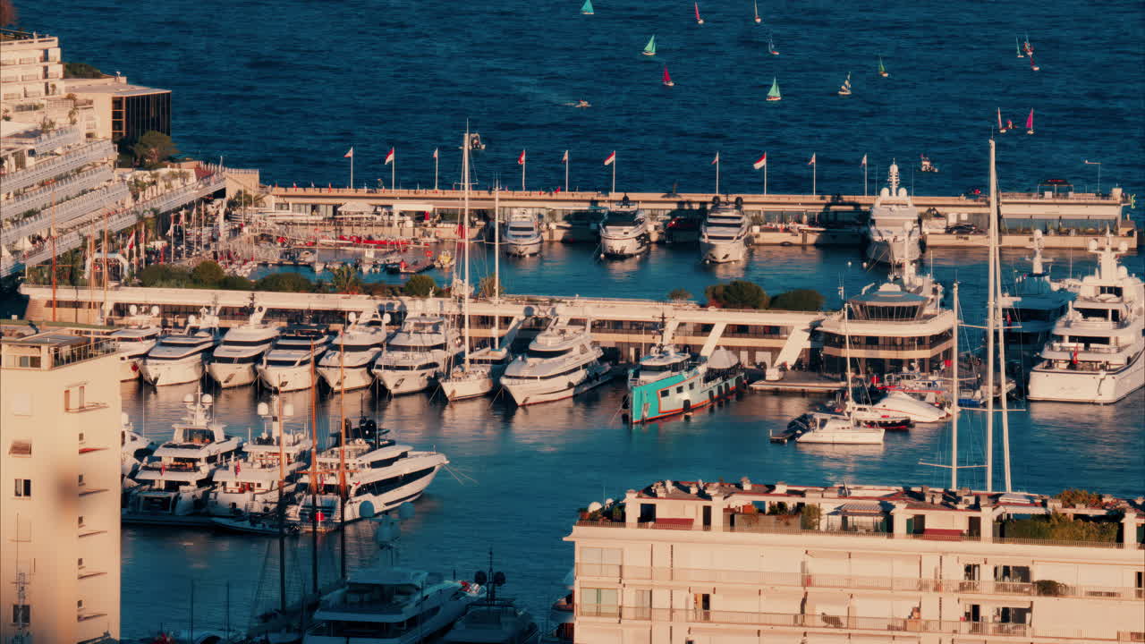View of boats docked in the Monaco Marina in the evening