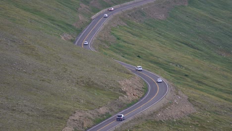 car driving at high altitude mountain road in colorado