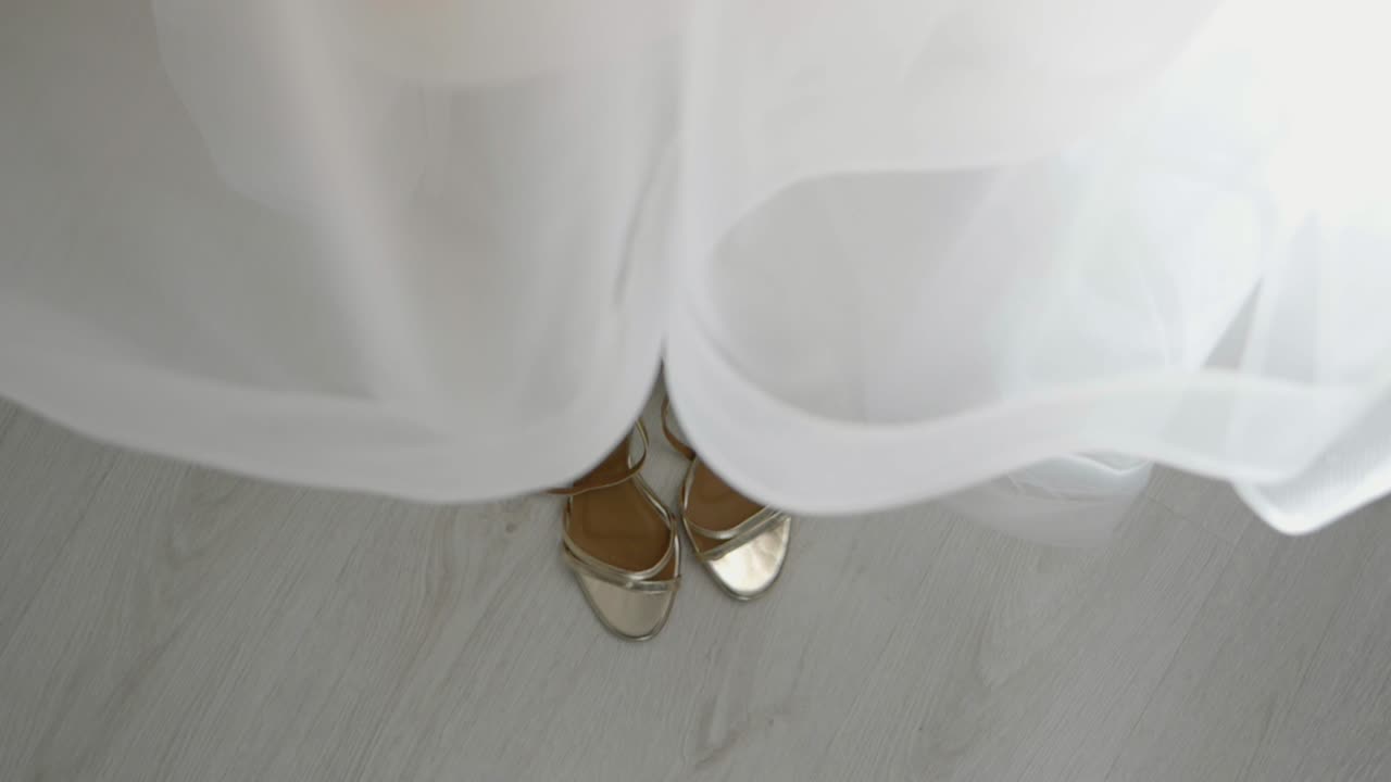 Bride’s Morning – Elegant Dress and Shoes Seen from Above in Slow Motion
