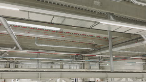 industrial facility ceiling with ventilation and piping systems