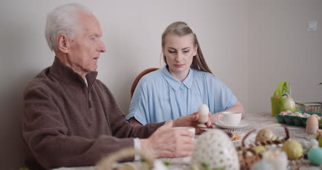 Happy-Easter-Grandfather-And-Granddaughter-Spending-Easter-Together-At-Home-3