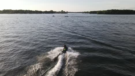 Riding-a-jet-ski-in-Lake-Minnetonka-during-summer-tine