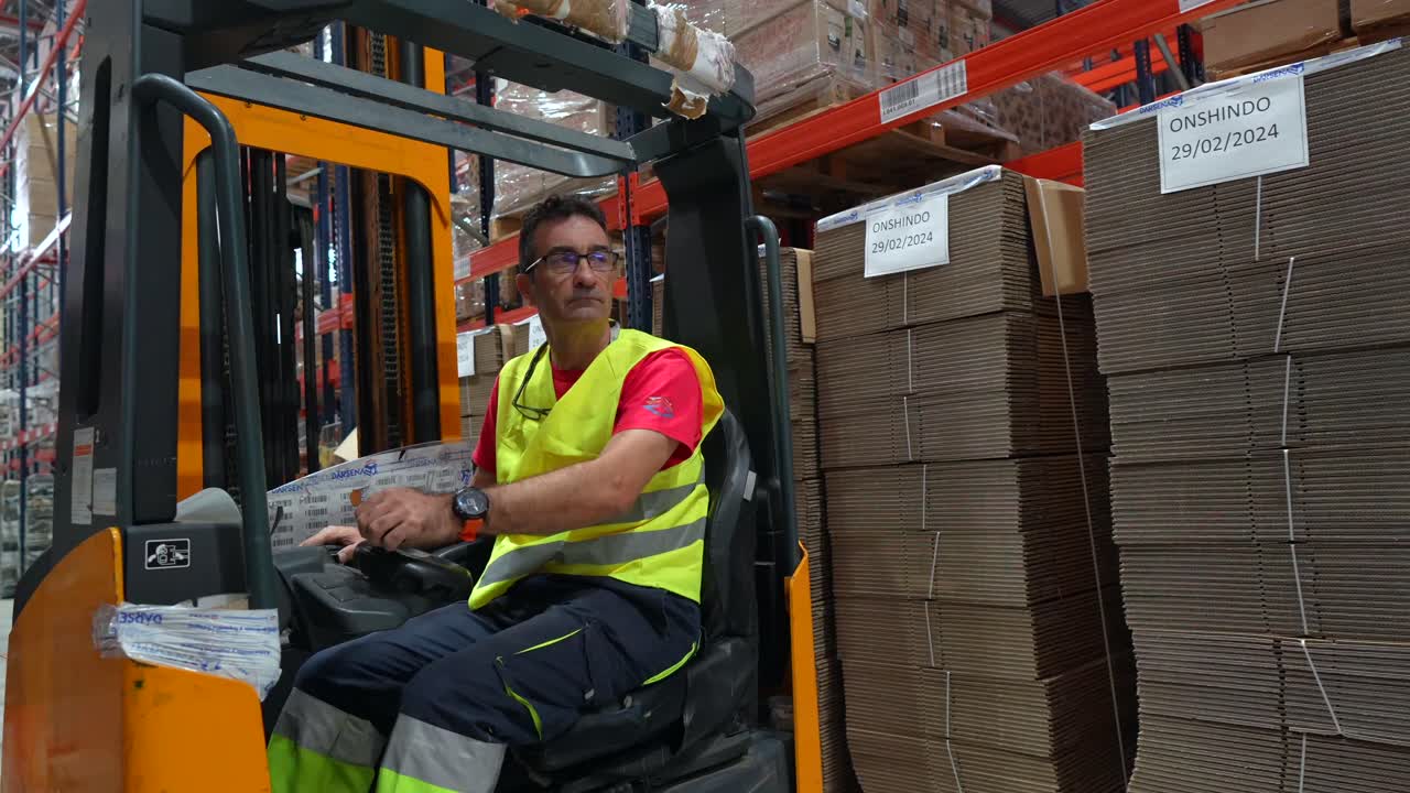 Forklift driver in a warehouse
