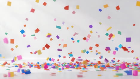 colorful confetti falling and scattered on white background