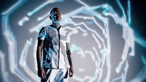 man adorned with digital circuitry in a futuristic projection