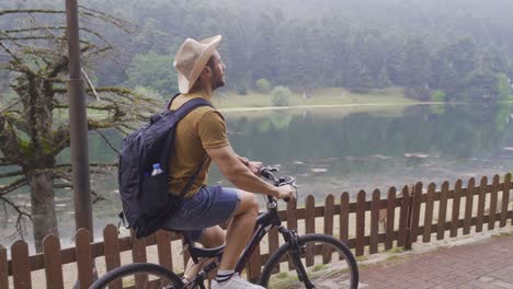 tourist man traveling by bike.