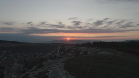 sunrise over a mountainous landscape