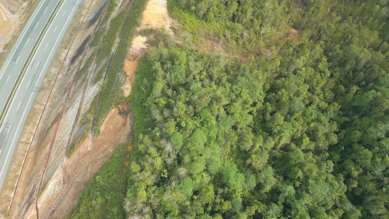 Beautiful Drone View Of Bau To Lundu Pan Borneo Highway During Morning Sunset With Mountain And Valley, Green Forest,Sarawak, Borneo.