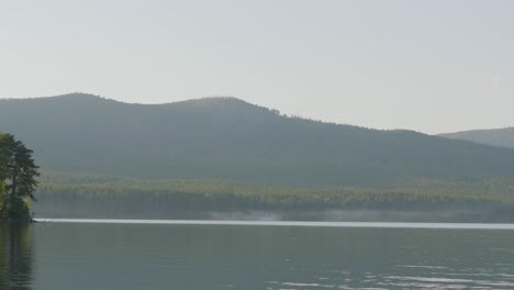 misty mountain lake sunrise