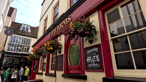 a quaint alley with a historic pub