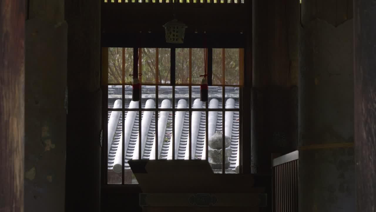 Slow motion slider over interior of typical Japanese shrine