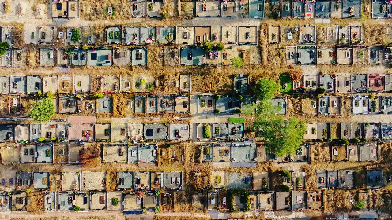 Symmetrical grave patterns of Jaunie Bolderājas Cemetery seen from spring drone flyby
